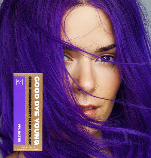 Model with bright purple hair color by Good Dye Young in the shade PPL Eater