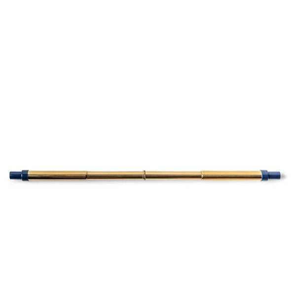 Extended stainless steel straw with gold tone and dark blue plastic ends