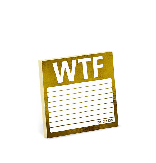 Metallic gold lined sticky note pad says, "WTF" in large lettering at the top