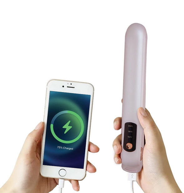 Flat iron styler doubles as a power bank for a smartphone via USB cable