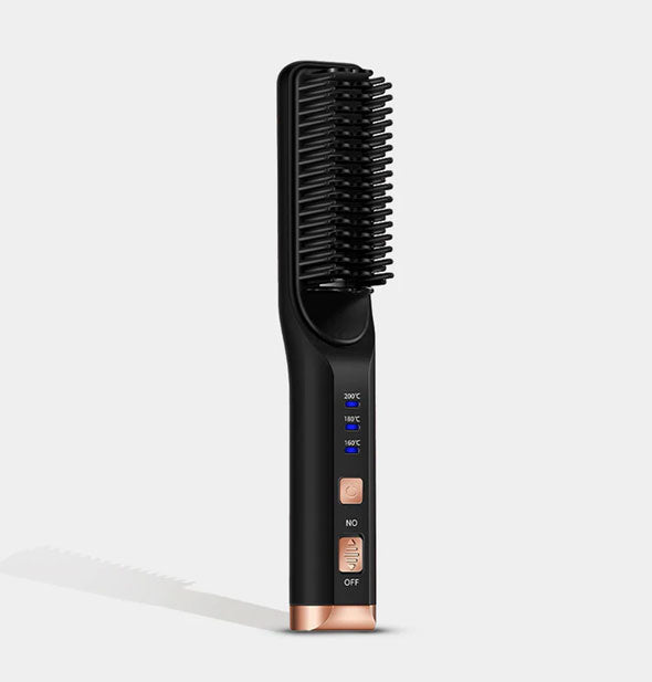 Electronic hair straightening brush