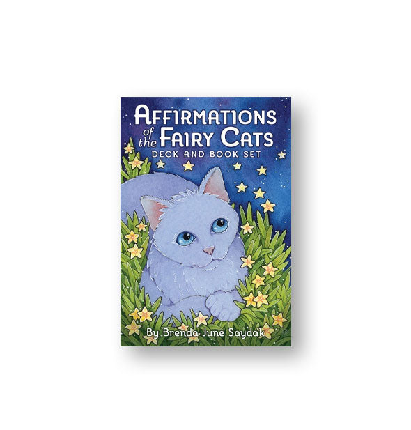 Affirmations of the Fairy Cats Deck and Book Set box features colorful and dreamy illustration of a silvery-purple feline laying in green grass surrounded by yellow flowers that drift upward, turning into stars in a blue night sky