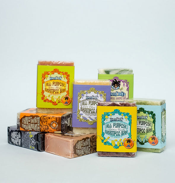 Stack of Knotty Boy All Purpose Shampoo Bars in various fragrances and label styles