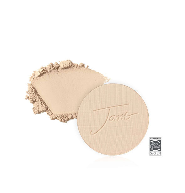 Jane Iredale PurePressed Base Mineral Foundation Refill with sample product swatch behind in the shade Amber