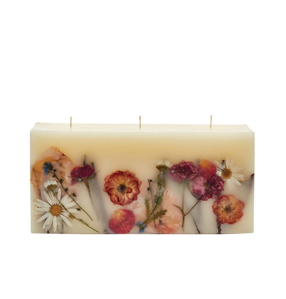 Rectangular three-wick candle with inlaid flowers and botanicals