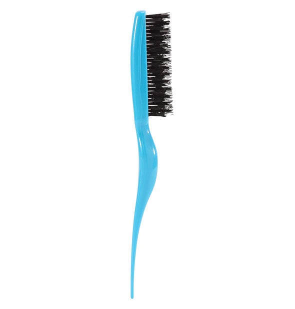 Blue teasing brush with dense black bristles