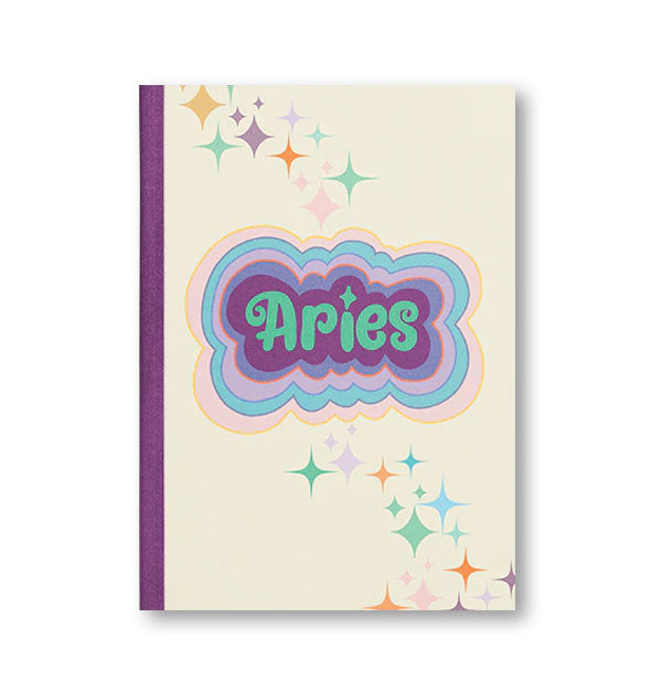 Notebook cover with purple binding, colorful stars, and colorful radiant lettering that reads, "Aries"