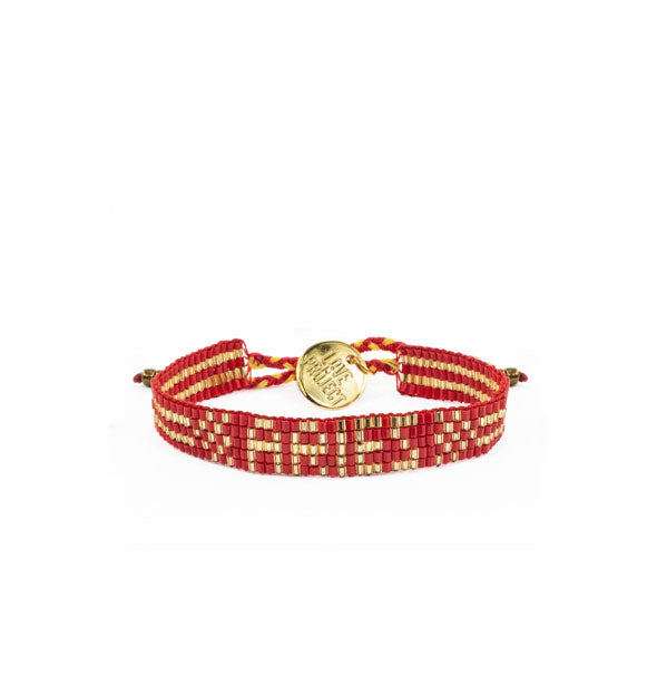Red and gold beaded Aries bracelet with round gold Love Is Project stamped tab attached