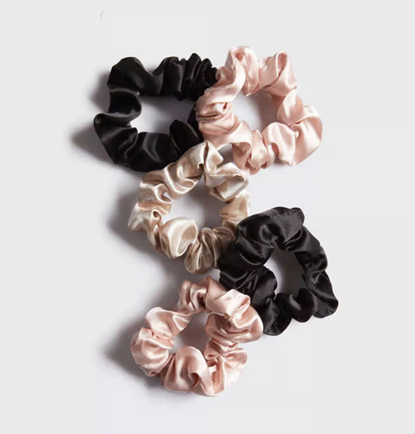 Five satin hair scrunchies in assorted colors