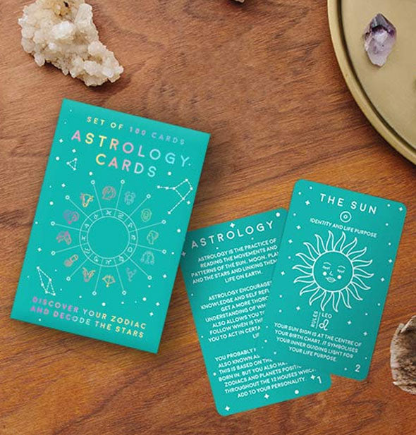 Sample Astrology Cards with box on a wooden surface with crystals
