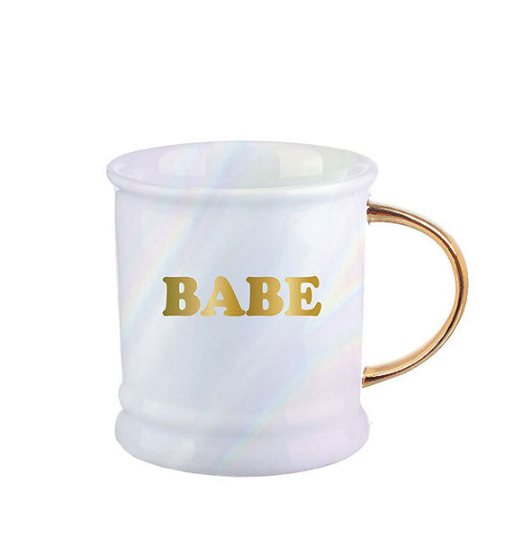 Pearlescent white coffee mug with gold handle says, "Babe" in metallic gold lettering