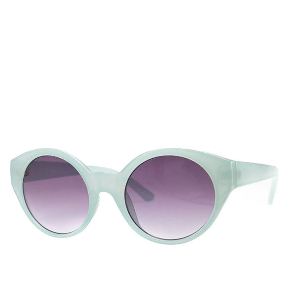 Round sunglasses with frosty baby blue frame and purple lens
