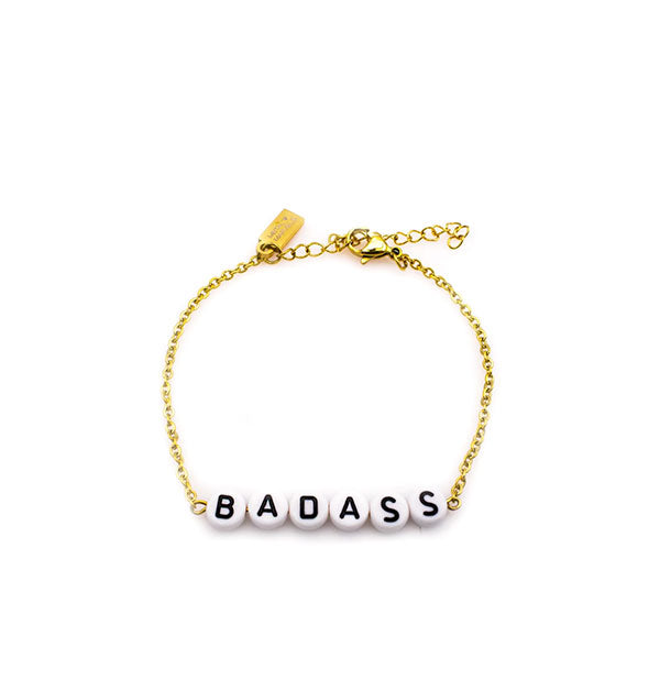 Gold chain bracelet with black and white letter beads that spell, "Badass"