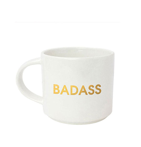 White coffee mug says, "Badass" in metallic gold foil lettering