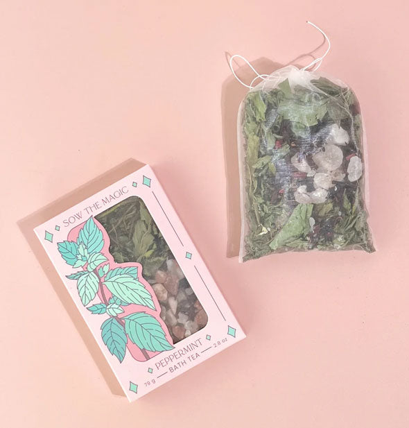 Peppermint Bath Tea box with sachet by Sow the Magic rest on a pink surface