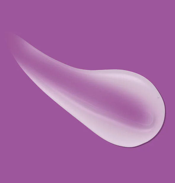 Sample of Bumble and bumble Curl Anti-Humidity Gel-Oil on purple background shows product color and consistency