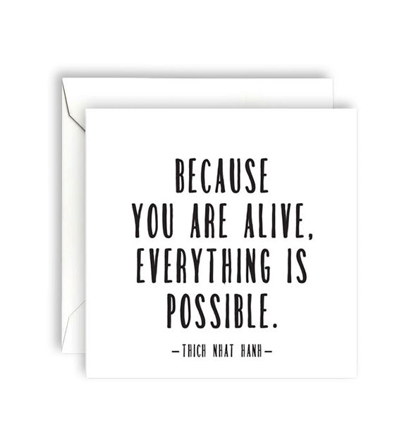 Square white greeting card with envelope is printed in black lettering with a quote by Thich Nhat Hanh: "Because you are alive, everything is possible."