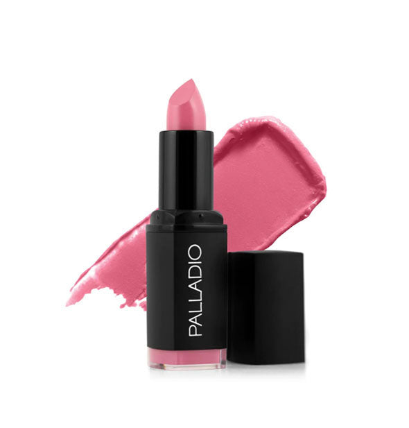 Black tube of Palladio lipstick with cap removed and color swatch behind in a pink shade called Bella Pink