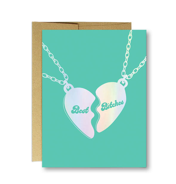 Teal greeting card with kraft envelope behind features holographic heart necklace design that says, "Bad Bitches"