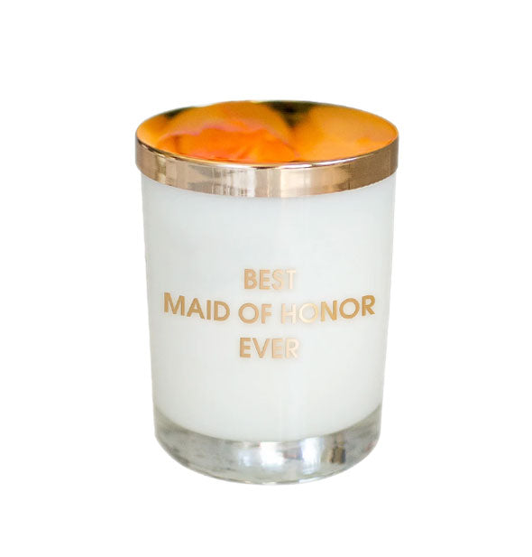 White wax candle in clear glass says, "Best Maid of Honor" in gold lettering and is topped with a gold lid