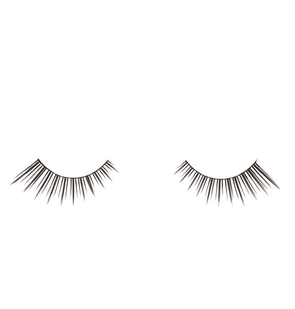 Pair of strip lashes with shorter fibers on the inside that increase in length to the outside