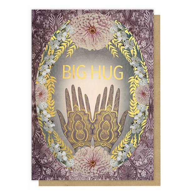 Greeting card with intricate floral and hands design says, "Big Hug" in metallic gold lettering