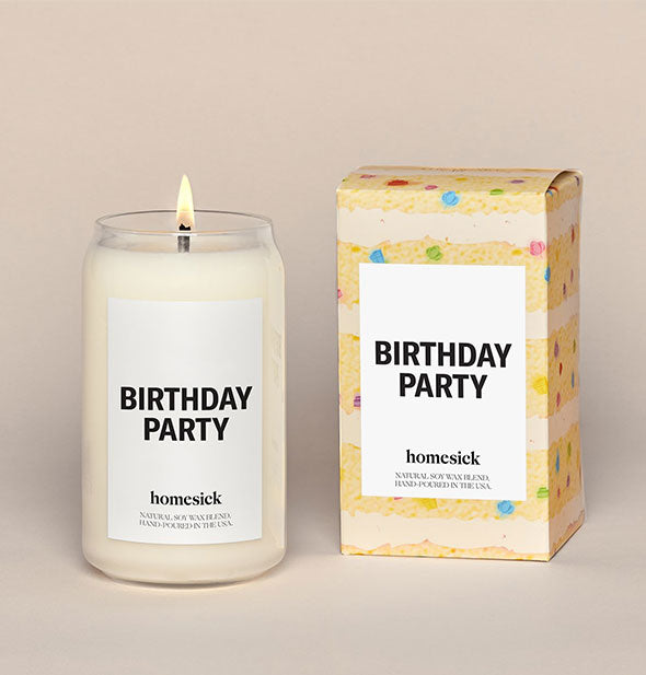 Clear glass Birthday Party candle by Homesick next to decorative box packaging