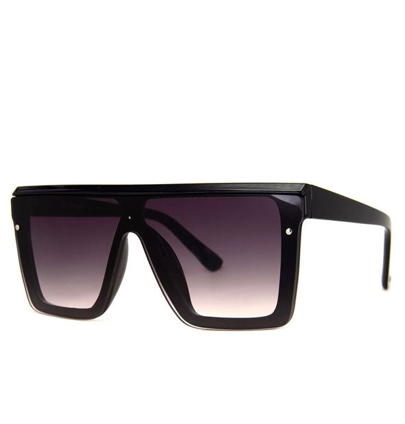 Pair of square black aviator sunglasses with gradient lens tint