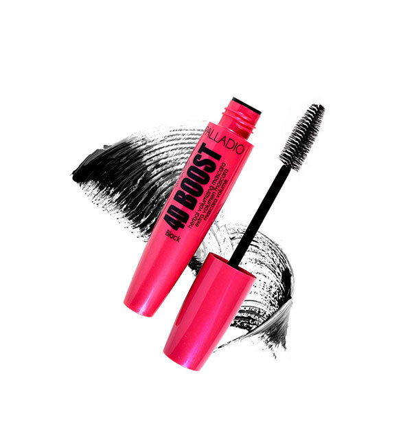 Hot pink tube of 4D Boost Palladio mascara with applicator removed and black smudges of product drawn behind