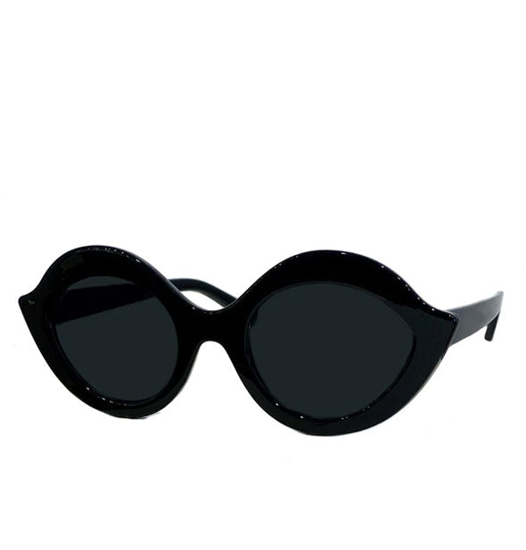 Pair of black sunglasses with eye-shaped frames