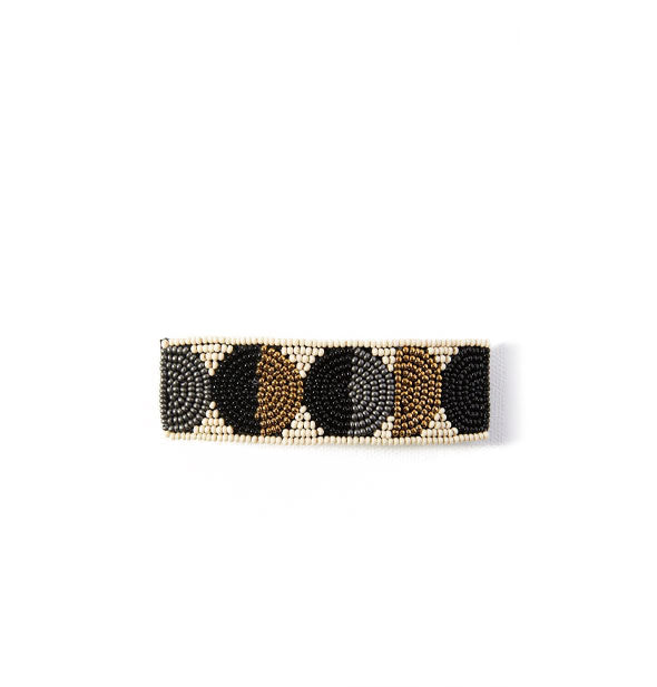 Rectangular beaded hair barrette with ivory, black, gold, and charcoal circular design