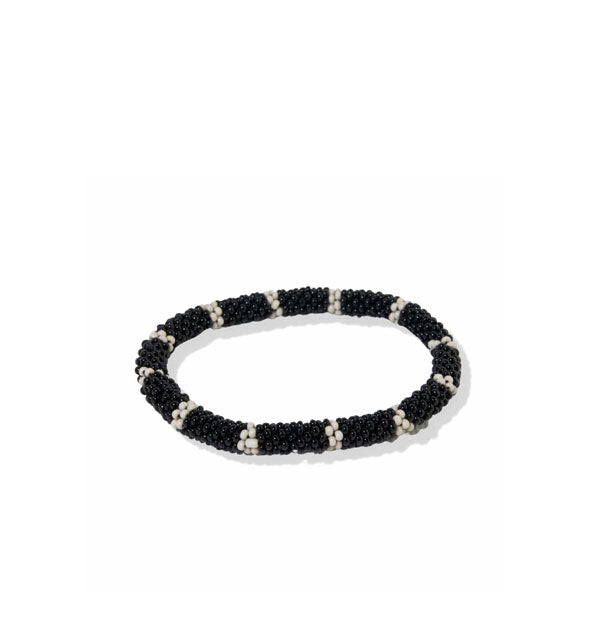 Bracelet covered with black and white striped beadwork