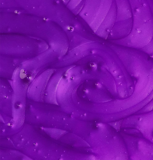 Closeup of IGK Blonde Pop Purple Toning Conditioner
