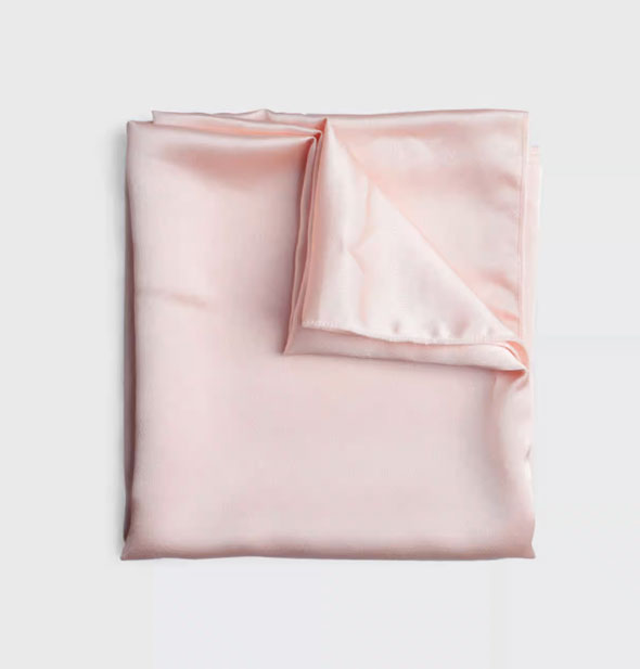 Folded pink satin headscarf