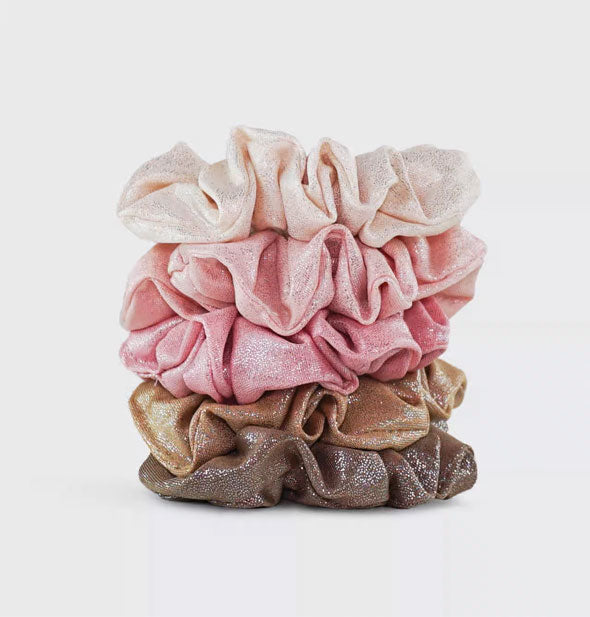 Stack of five hair scrunchies in pink and brown metallic fabrics