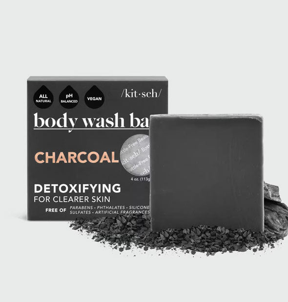 Body Wash Bar soap by Kitsch with box packaging surrounded by crumbled charcoal