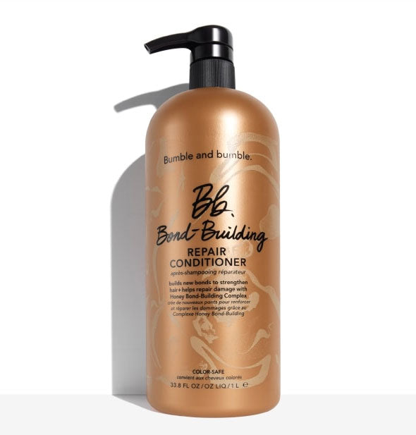 Copper-colored 33.8 ounce bottle of Bumble and bumble Bond-Building Repair Conditioner with black pump nozzle
