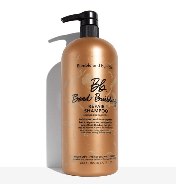 Copper-colored 33.8 ounce bottle of Bumble and bumble Bond-Building Repair Shampoo with black nozzle