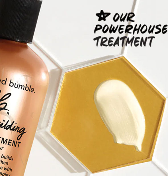 Sample of Bumble and bumble Bond-Building Repair Treatment next to bottle is captioned, "Our powerhouse treatment"
