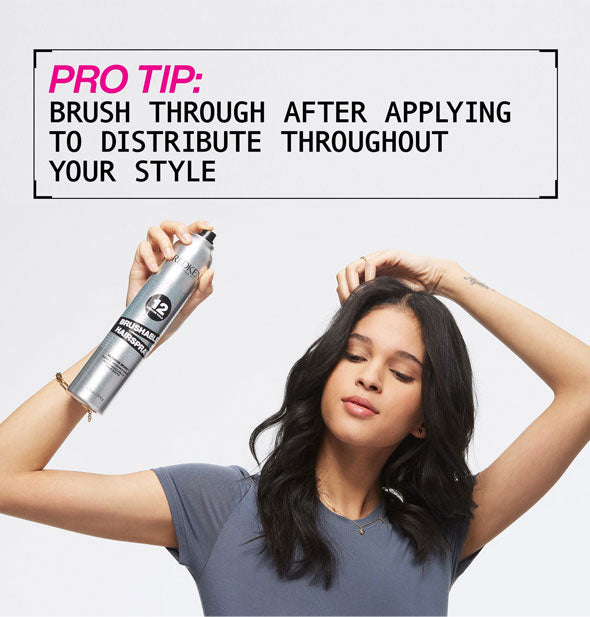 Model applies Redken Brushable Hold Hairspray under the caption, "Pro Tip: Brush through after applying to distribute throughout your style"