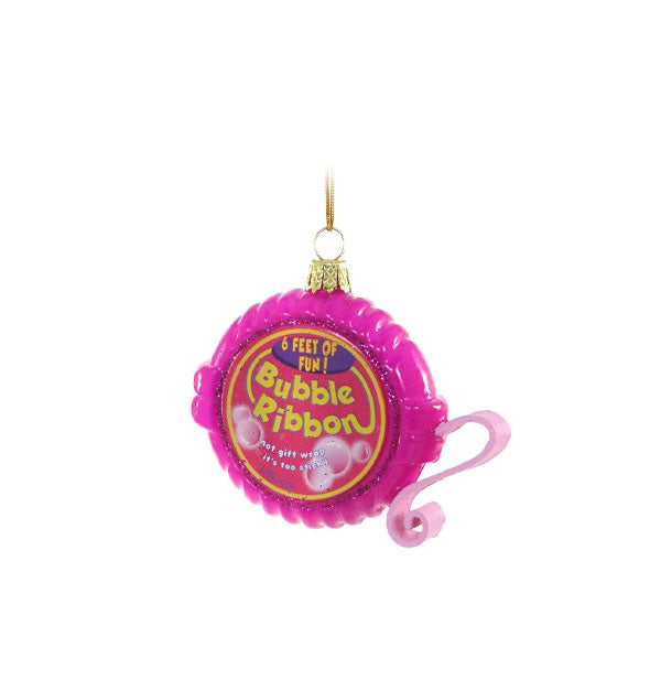 Round pink glass ornament is painted and designed to resemble a container of Bubble Ribbon gum