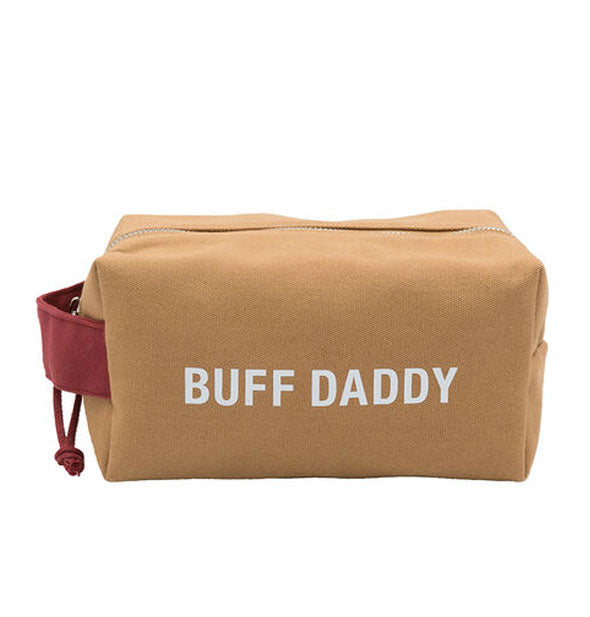 Brown canvas dopp bag with burgundy side handle and zipper pull says, "Buff Daddy" in white lettering on the side
