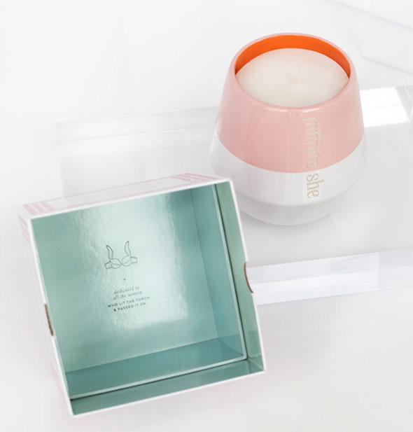 Infinite She candle with box interior shown