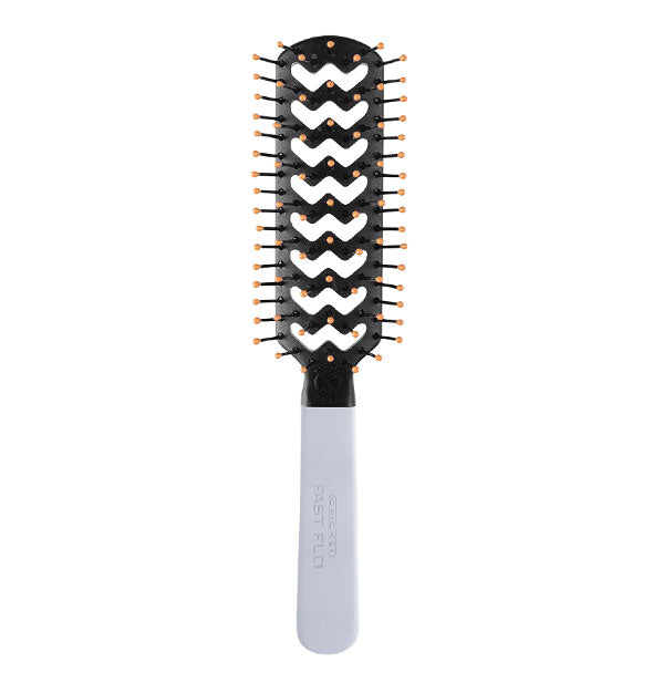 Vented hairbrush features zigzag vent pattern in paddle, grayish-purple handle, and yellow bristle ball tips
