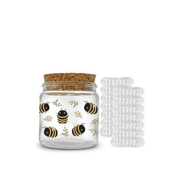 Cork-lidded jar with bumblebee illustrations is paired with 12 clear spiral hair ties