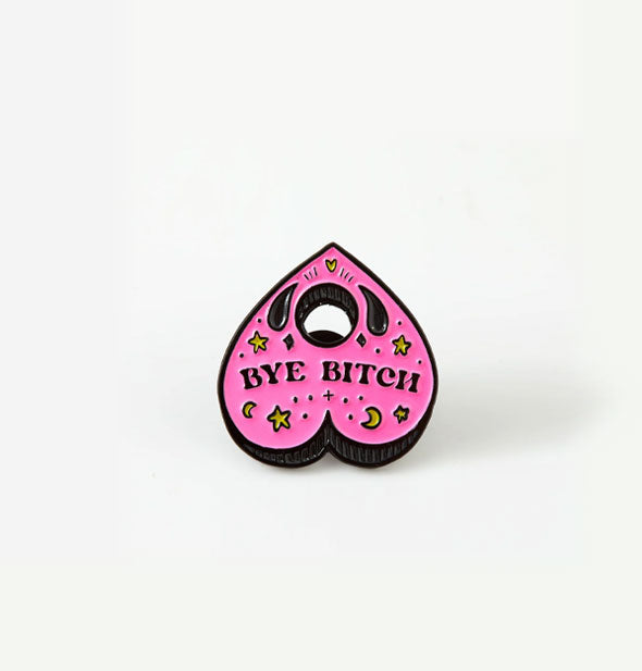 Pink heart-shaped ouija planchette enamel pi says, "Bye Bitch" surrounded by tiny stars and moons
