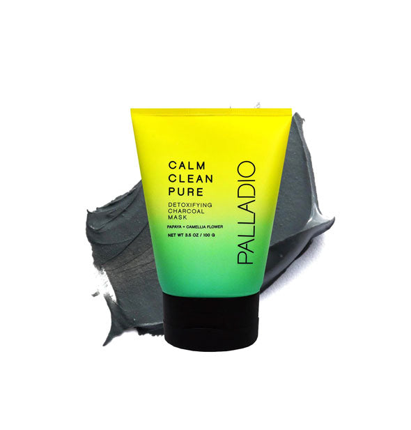 3.5 ounce bottle of Palladio Calm Clean Pure Detoxifying Charcoal Mask with product sample behind