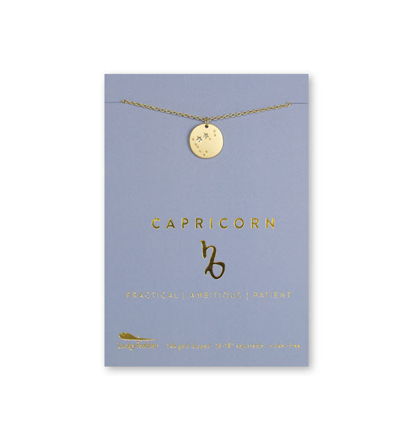 Gold Capricorn necklace on card with metallic gold print and symbol