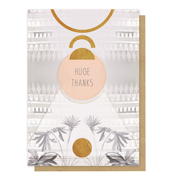 Huge Thanks greeting card with tropical floral illustration on a monochromatic geometric background accented with gold foil shapes