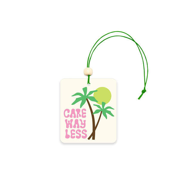 Square white car air freshener with palm trees and sun illustration says, "Care Way Less" in pink lettering
